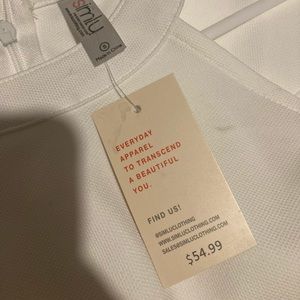 White a-line Women’s dress. Never worn.